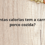 Quantas calorias tem a carne de porco cozida?